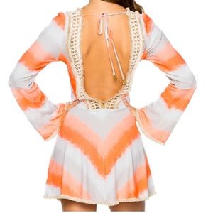 Luli Fama deep plunge dress Los flamencos